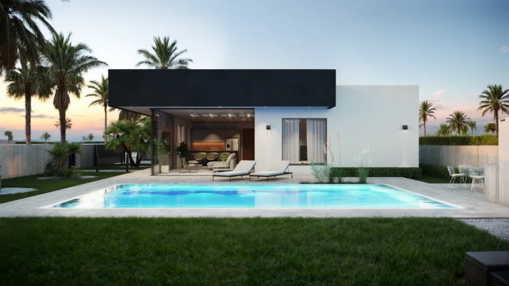 Fachada moderna posterior con piscina y terraza abierta al atardecer.